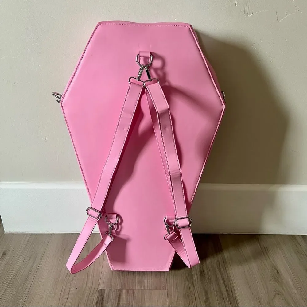 Dolls Kill oversize pink and black skull spiderweb coffin backpack. New in box
